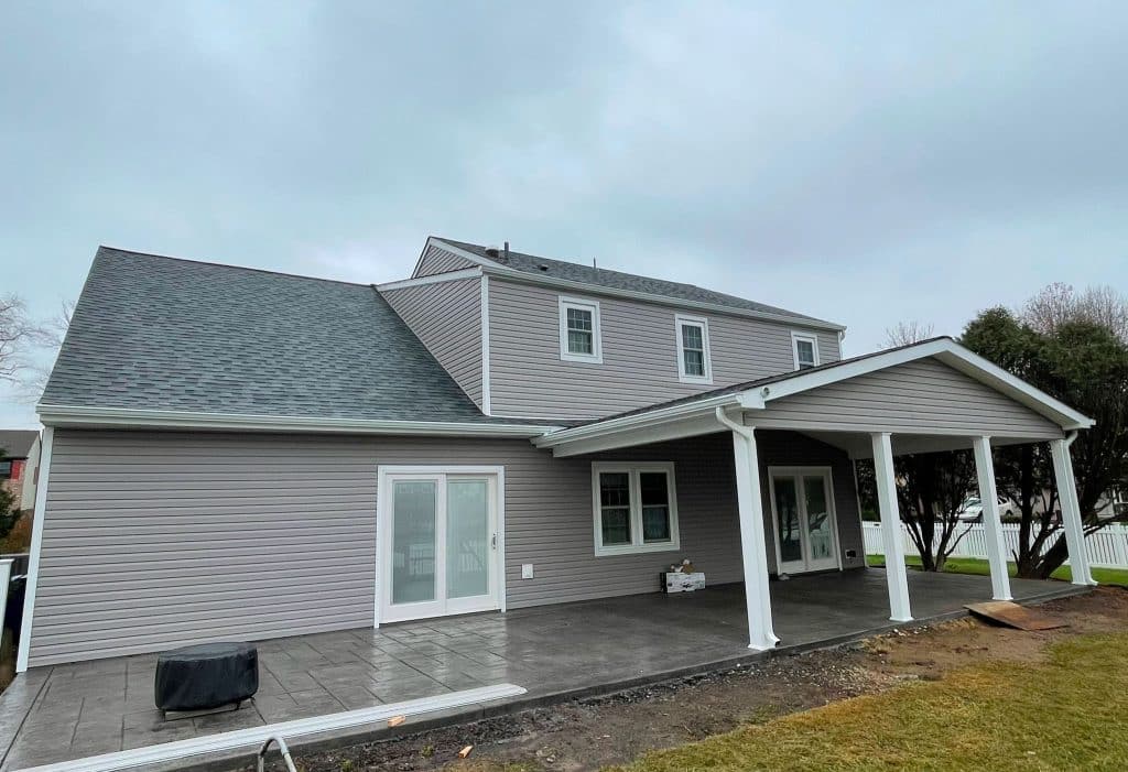 Professional exterior remodeling and renovations by J. Tretter and Sons in Langhorne, PA including roofing replacement, custom patio, new siding and windows